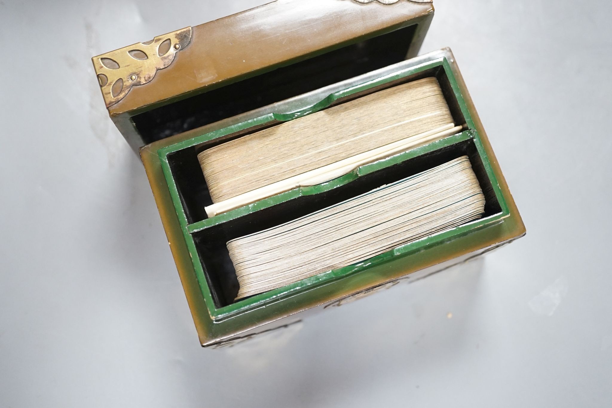 A MahJong set and a Chinese brass mounted card case., MahJong set, 15.5 cms high x 23.5 cms wide.